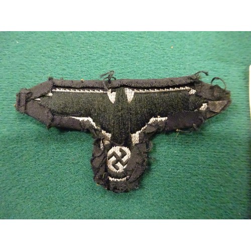 75 - Third Reich SS insignia: embroidered breast eagle, woven cap eagle, silver bullion embroidered cuff ... 