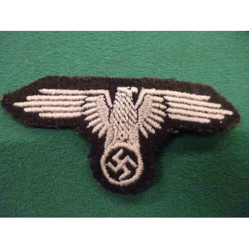 75 - Third Reich SS insignia: embroidered breast eagle, woven cap eagle, silver bullion embroidered cuff ... 