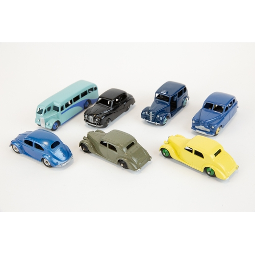 328 - 7 well restored early Dinky Toys. 2x Raleigh Saloons, colour variations. Standard Vanguard, Austin S... 