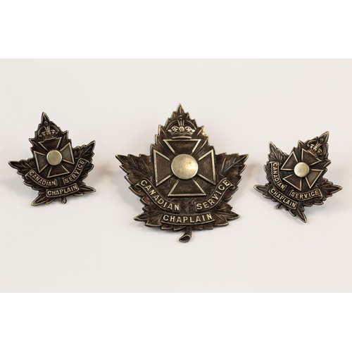 178 - WWI CEF cap badge of the Canadian Chaplains Service, with tangs, and a matching pair of collar badge... 