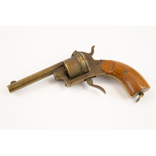 18 - A late 19th century brass cigar cutter, in the form of a pin-fire revolver, 6½