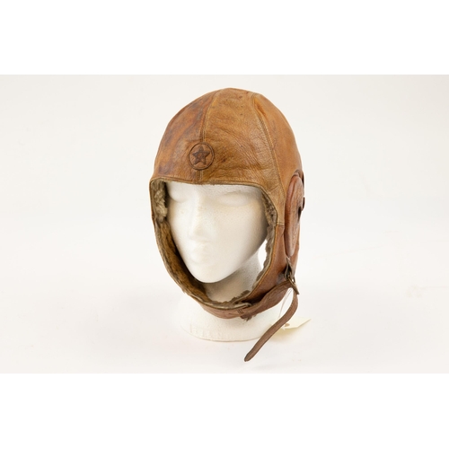 226 - A scarce WWII Japanese fleece lined brown leather flying helmet, with integral 5 pointed star badge,... 