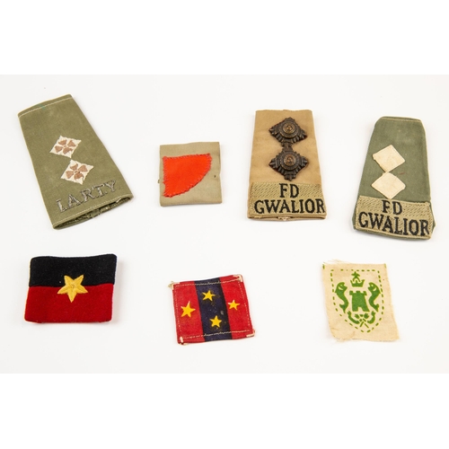 235 - Selection of British Army Tropical/Indian rank slides and formation signs (7). £50-80