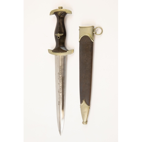 113 - A Third Reich 1933 model SS dagger, by Robert Klaas, Solingen, with nickel silver mounts, the crossg... 