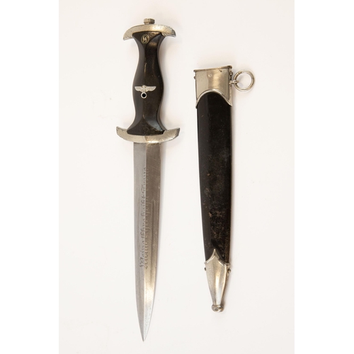 114 - A Third Reich 1933 model SS dagger, the blade etched with RZM and SS marks and 