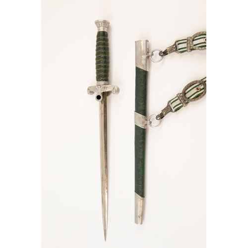 115 - A Third Reich Land Customs Official's dagger, plated blade by SMF, Solingen, the hilt with aluminium... 