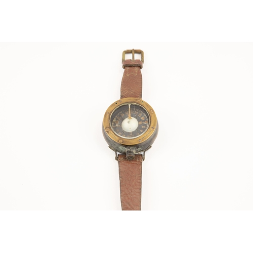 126 - A WWI Royal Flying Corps brass wrist compass, the rim marked 