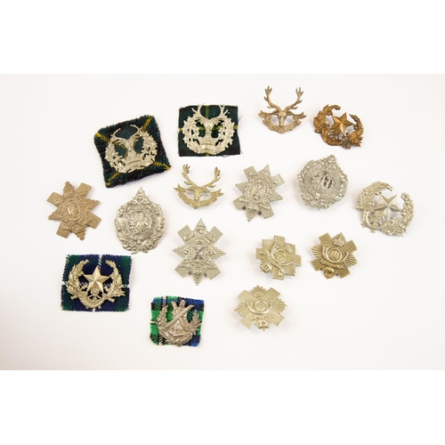 168 - 16 Scottish glengarry badges: Cameronians, large, smaller, and blackened brass (worn and repaired); ... 