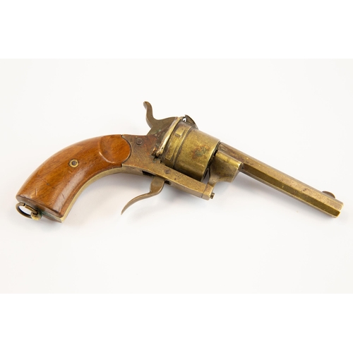 18 - A late 19th century brass cigar cutter, in the form of a pin-fire revolver, 6½