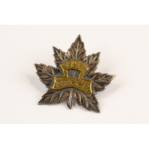 193 - A good scarce WWII Canadian officer's cap badge of the VIIIth Reconnaissance Regiment. GC £200-300