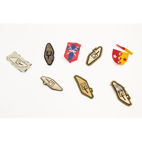 239 - 9 British Armoured/Tank insignia including various tank crew insignia. (9) £60-80