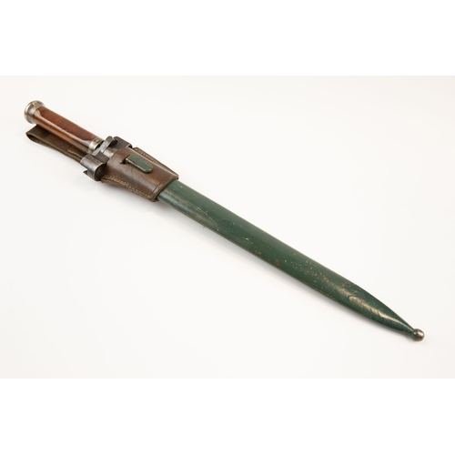 285 - A scarce Hungarian Mannlicher bayonet M1935, in its olive green steel scabbard, near VGC complete wi... 