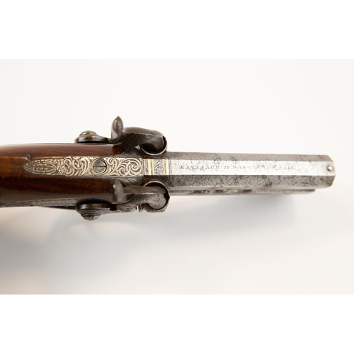 382 - An interesting Irish presentation double barrelled over and under 32 bore percussion pistol by Kavan... 