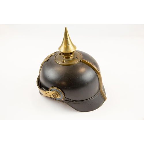 71 - A WWI Bavarian NCOs Pickelhaube, with brass badge, spike, mounts and chinscales, and with leather an... 