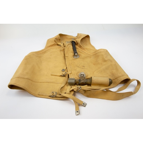 80 - A good WWII Battle of Britain era German Luftwaffe life jacket, with compressed air bottle, and make... 