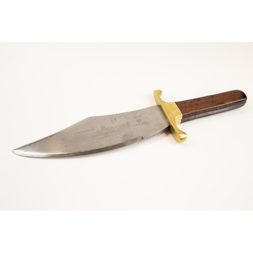 298 - A massive Bowie knife, blade 11