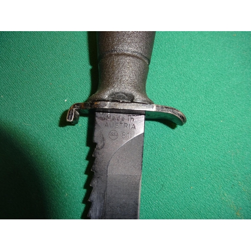 306 - A Wilkinson survival knife c 1970, 2 German combat knives; 2 other Continental survival knives. All ... 