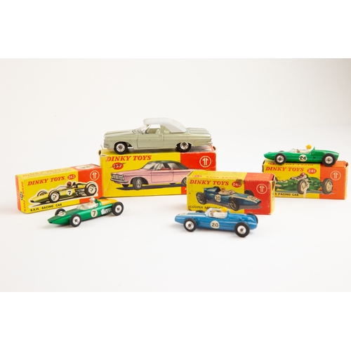 368 - 4 Dinky toys. To include No.243  B.R.M racing car finished in metallic green with a yellow plastic d... 