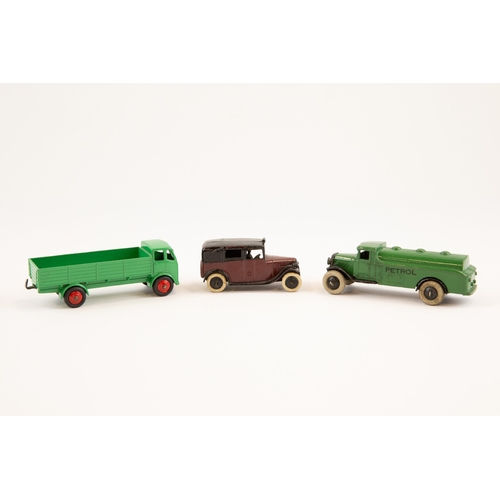 390 - 3 Dinky Toys. A just pre-war Petrol Tank Wagon (25d), in dark green, with PETROL to sides, smooth wh... 