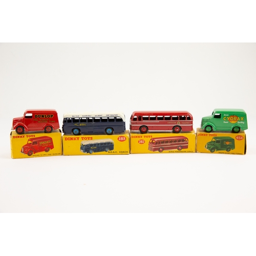 361 - 4 Dinky Toys.  Duple Roadmaster Coach (282), red. B.O.A.C. Coach (283), blue/white. 2x Trojan 15 cwt... 