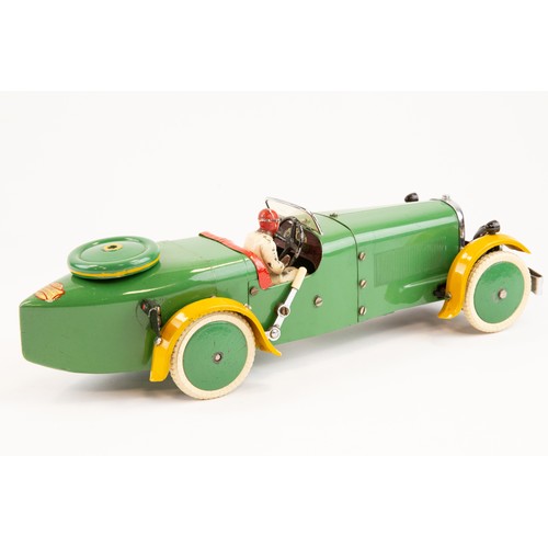 252 - A rare 1930's No.2 Meccano Constructor Car. A boat tail example in green with yellow mudguards, red ... 