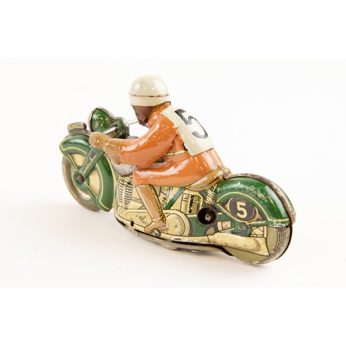 263 - Tinplate Schuco clockwork powered Racing Motorcycle. Length 13cm, Schuco Sport, racing number 5. In ... 