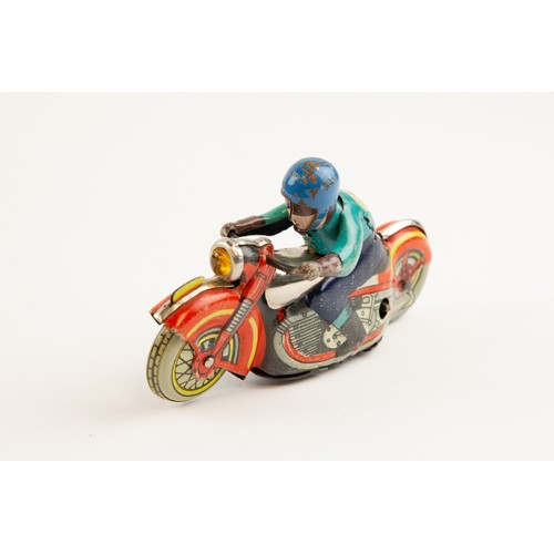 265 - German WV Tinplate clockwork powered Racing Motorcycle. Length 13cm, racing number 3. In red with ye... 