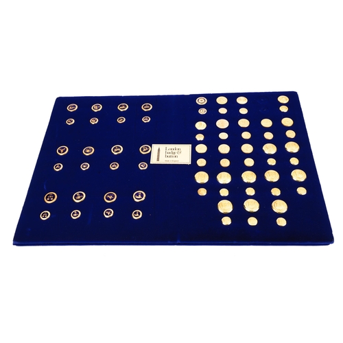 101 - Two London Badge & Button Company c 2000 blue velvet covered exhibition display boards of buttons, e... 