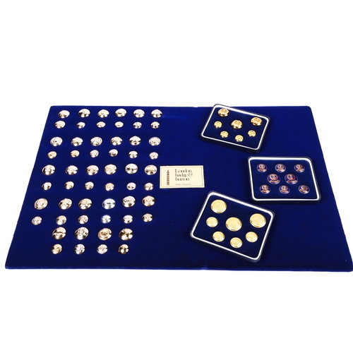 102 - Two London Badge & Button Company c 2000 blue velvet covered exhibition display boards of buttons, e... 