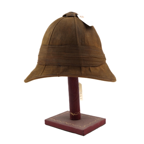 209 - A Boer War type Foreign service helmet, khaki coloured cloth with puggaree and flash, and bearing  L... 