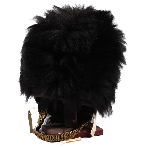 219 - A Victorian OR's bearskin cap of the Scots Guards, of the early type without the wicker frame, possi... 