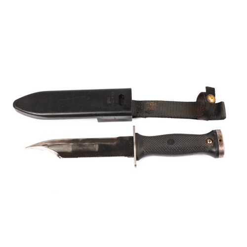 265 - A US Navy Mk 3 Mod O diver's knife, the rasp back blade numbered 