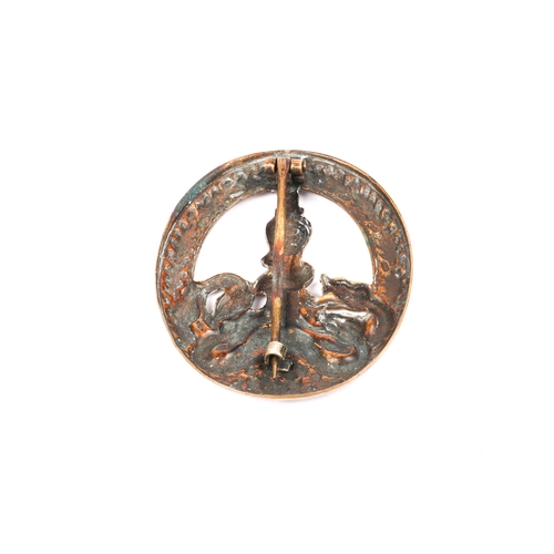 49 - A Third Reich Anti partisan badge, of die struck brass construction with round pin. GC (slightly wor... 