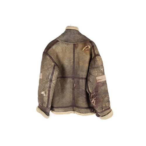 58 - A Third Reich Luftwaffe flying jacket, sheepskin lined, similar to an Irving jacket, with eagle etc ... 