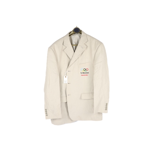 63 - A beige linen sports jacket, breast pocket embroidered 