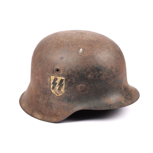 75 - A Third Reich M1943 SS raw edge steel helmet, retains 1 SS decal and traces of black finish, sound c... 