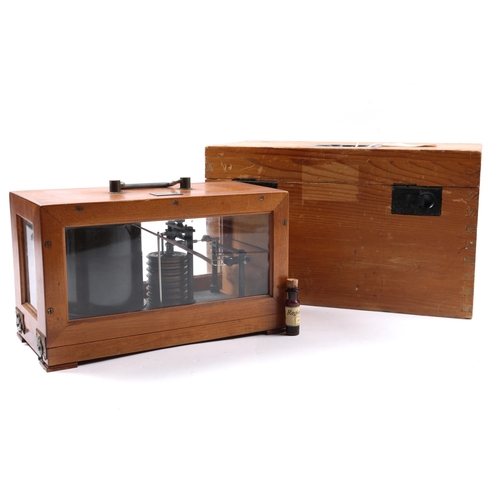 38 - A German WWII naval barograph, by G Lufft Metallbarometerfabrik, Stuttgart, the wooden case having a... 