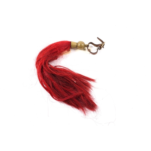 200 - A Victorian Yeomanry officer's horse jowl plume, red horse hair, heavy brass thistle holder and leat... 