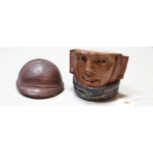 382 - A very nice ceramic tobacco jar in the form of a military pilot, the hat shaped lid comes off, the f... 