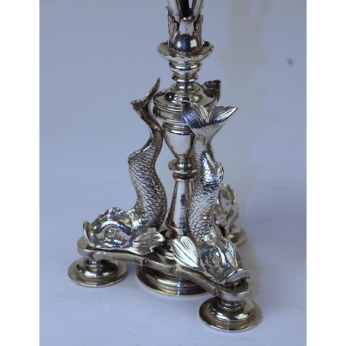 386 - A impressive pair of very good quality silver plated candelabra depicting 3 sea serpents to each bas... 