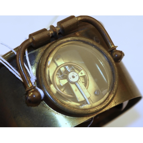 404 - A Victorian brass carriage clock, of unusual circular form, 3½