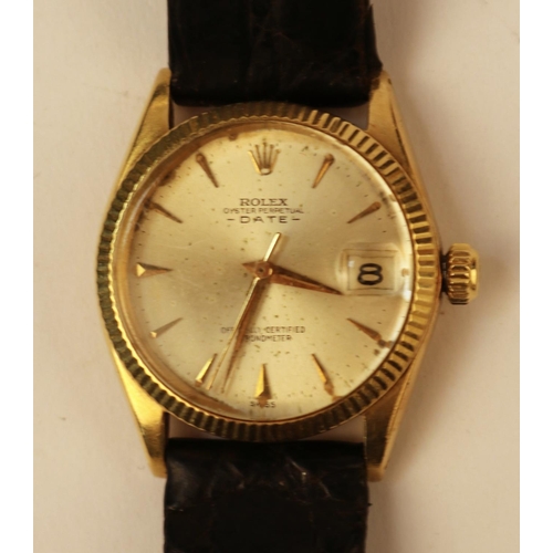 407 - A Rolex  Oyster perpetual date, in 18ct gold. Hall marked to the rear of the case. Used condition, w... 