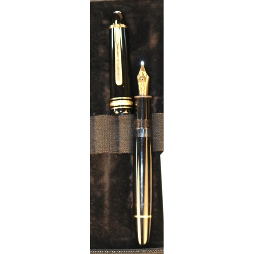 430 - Mont Blanc Le Grand Fountain Pen. With gold nib, body in black with gold detailing, Mont-Blanc logo ... 