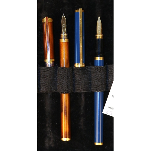 437 - 2 DuPont Laque De Chine Fountain Pens. Both with gold nibs. One in dark blue and the other in varieg... 