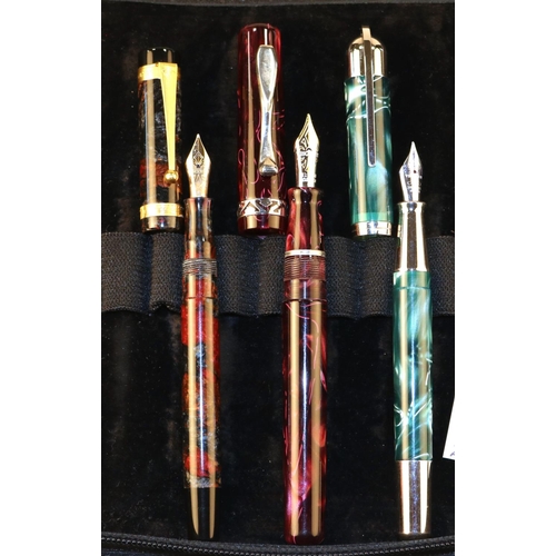 441 - 3 Visconti Fountain Pens. All of variegated design. One basically red with gold nib and gold coloure... 