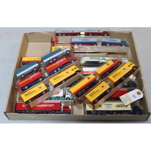 481 - 19 Wiking HO scale  Mercedes trucks, many with trailers and in different colours and liveries. All c... 