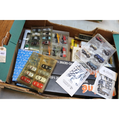 483 - A quantity of HO scale plastic model vehicles by various makers. Lot includes Herpa, Praline Walldor... 