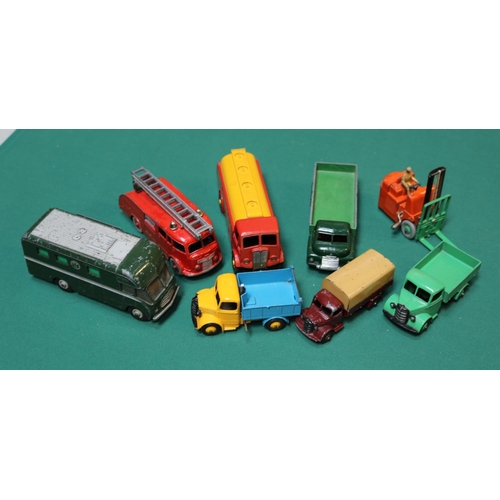 585 - 8 Dinky Toys. Bedford Tipping Wagon in yellow/blue. Bedford Wagon in green. Austin Lorry in maroon w... 