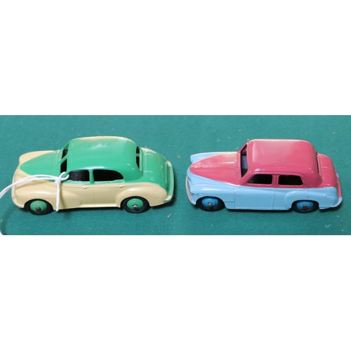 603 - 2 Dinky Toys. A Hillman Minx (154). With blue lower body, cerise upper body and blue wheels. A Morri... 