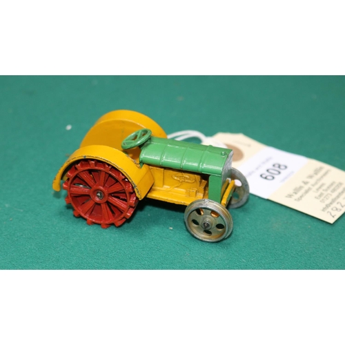 608 - A Dinky Toys Farm Tractor. In green and yellow with cast-in hook. Unpainted base and front wheels. V... 